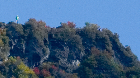 "Chimneys in October" 100% crop (close up view showing person standing on right peak) and another starting descent.  Shot with Nikon 200mm 2.0 VR lens on Nikon D2X professional grade equipment.  Not a