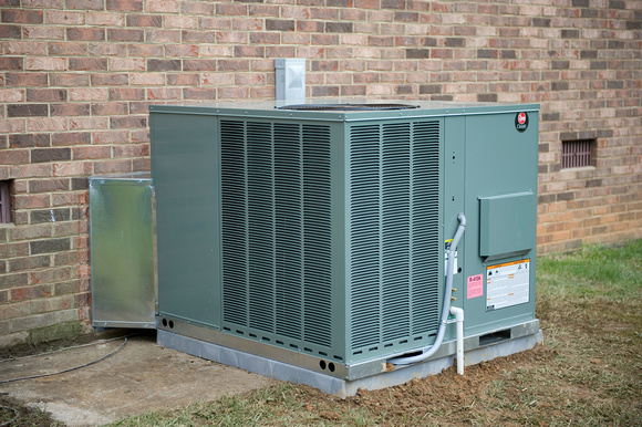 Spring 2009, In with the new Rheem 13 SEER Package Gas heat and electric AC.  So far, I like this 3.5 ton package unit.  Compressor went out on 15 year old Amana, and with some funny oders in heat sea