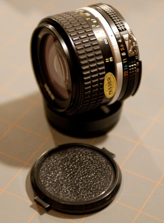 28mm lens still has Nikon passed emblem!